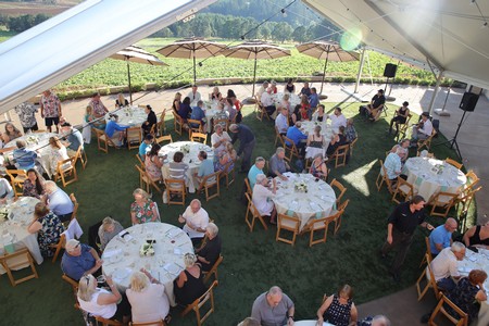 Owners gathered for a meal at the Willamette Valley Vineyards Estate tasting room in Turner, Oregon during a previous years owner weekend. 