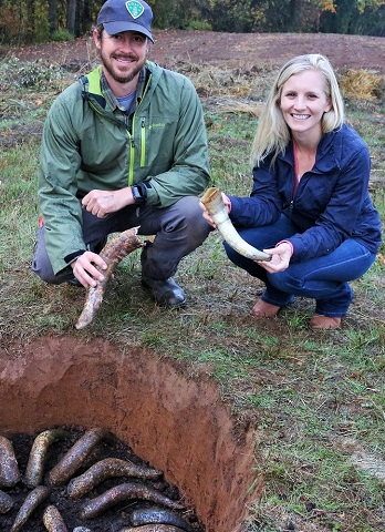 Clay and Christine holding cow horns