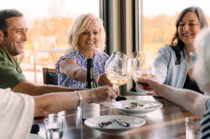 Guests toasting sparkling wine at Domaine Willamette