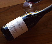 Revino reusable bottle labeled with the 2023 Whole Cluster Pinot Noir